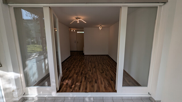 2-Zimmer-Wohnung mit Wintergarten und Tiefgaragenplatz in ruhiger Lage