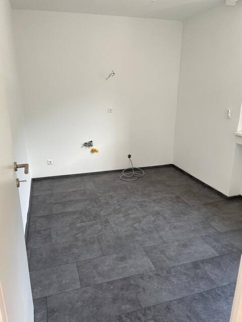 Lichtdurchflutete 2-Zimmer-Wohnung mit Balkon & Dachterrasse in zentraler Lage