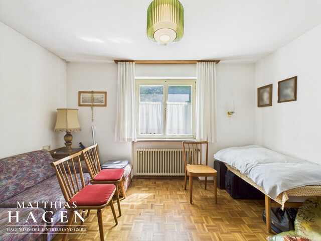 Grundstück mit Altbestand in toller Wohnlage