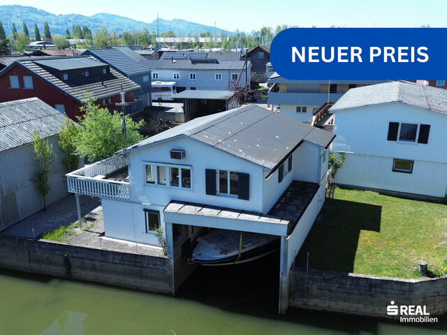Ferienhaus mit Bootsgarage