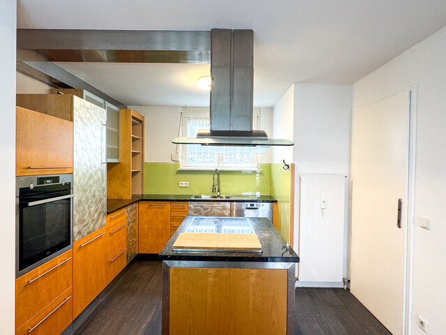 Familienfreundliche 4,5-Zimmer-Wohnung mit großzügigem Balkon & Tiefgarage