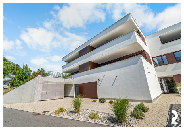 MODERNE 4-ZIMMER-WOHNUNG MIT TERRASSE UND TIEFGARAGENPLATZ