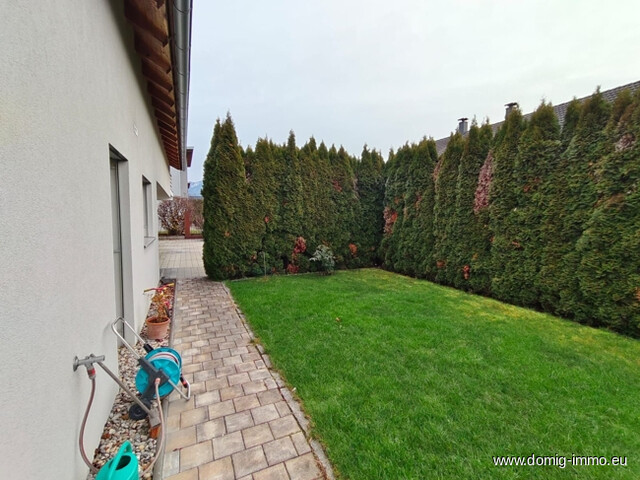 Stilvolles Einfamilienhaus mit Einliegerwohnung, Designausstattung & Traumgarten