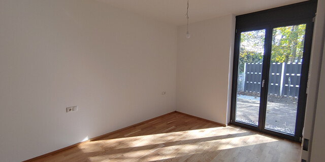 Neuwertige exklusive 3-Zimmer-Wohnung mit Garten im Herzen von Mäder – inkl. Tiefgaragenplatz