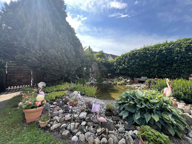 MEHRFAMILIENHAUS MIT VIEL GARTEN IN TOPLAGE