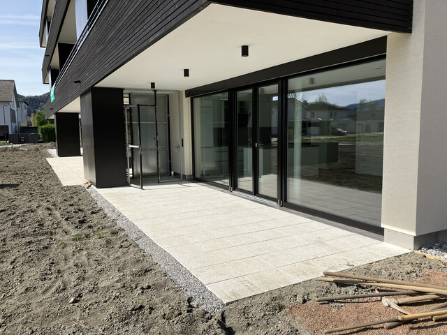 Neubau Gartenwohnung mit Terrasse, Garten, 2 Garagen in Toplage!