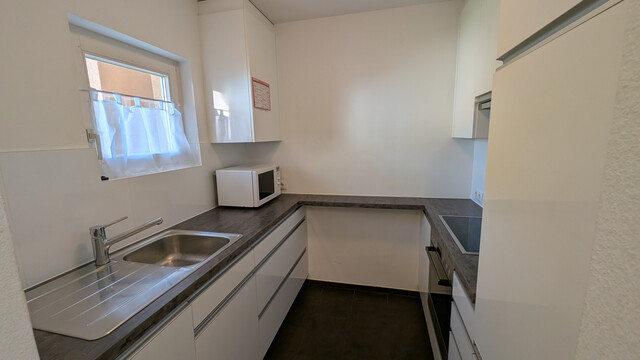 2-Zimmer-Wohnung mit Wintergarten und Tiefgaragenplatz in ruhiger Lage