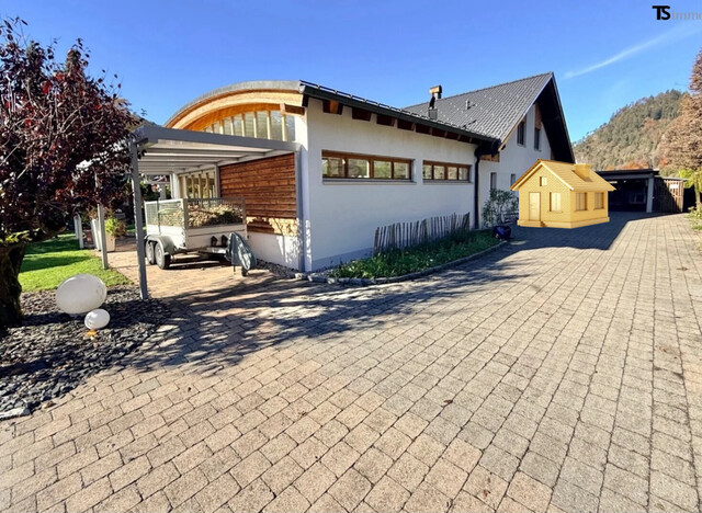 Nüziders: Einfamilienhaus mit Garten - Premium-Immobilie – Wohnjuwel mit Wintergarten, Wellnessbereich & Traumgarten