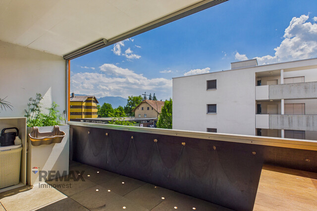 Grenznah wohnen: Moderne Terrassenwohnung für Pendler und Genießer