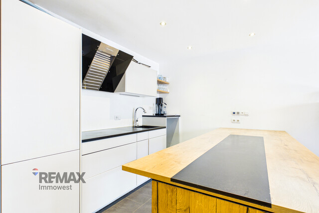 Grenznah wohnen: Moderne Terrassenwohnung für Pendler und Genießer