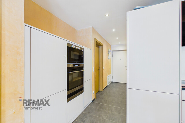 Grenznah wohnen: Moderne Terrassenwohnung für Pendler und Genießer