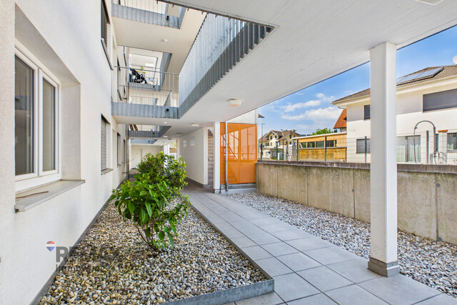 Grenznah wohnen: Moderne Terrassenwohnung für Pendler und Genießer