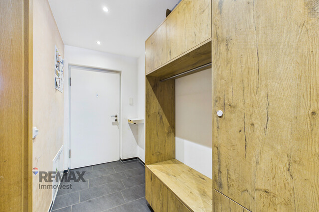 Grenznah wohnen: Moderne Terrassenwohnung für Pendler und Genießer