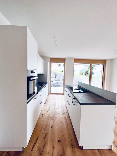 Hochwertige Gartenwohnung in Neubau (2023)