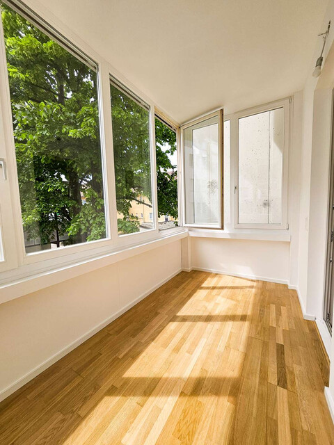 Renovierte Altbauwohnung mit Veranda in Seenähe
