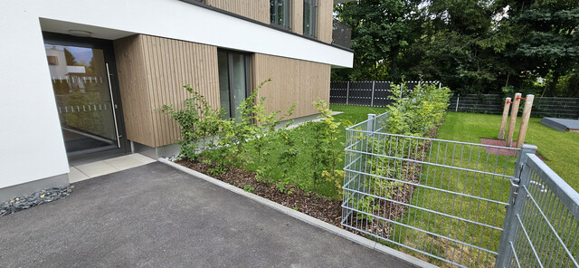 Neuwertige exklusive 3-Zimmer-Wohnung mit Garten im Herzen von Mäder – inkl. Tiefgaragenplatz