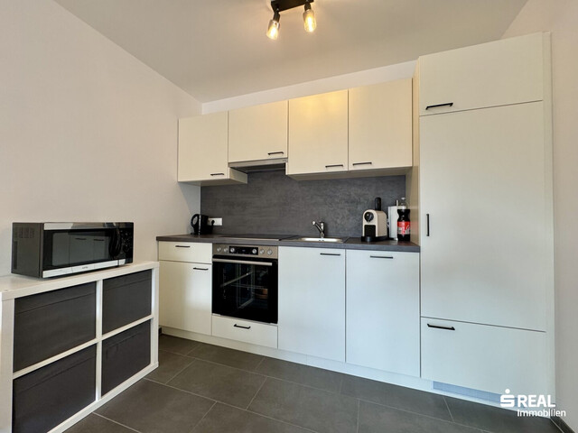 Neuwertige 2-Zimmerwohnung mit Balkon & Tiefgarage