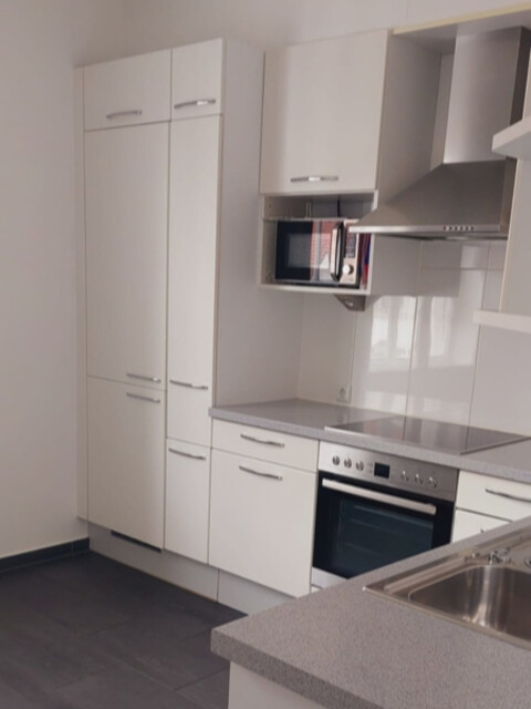 Stilvolle 2-Zimmer-Altbauwohnung in der ehemaligen Bregenzer Nationalbank – Exklusives Wohnen im Herzen der Fußgängerzone