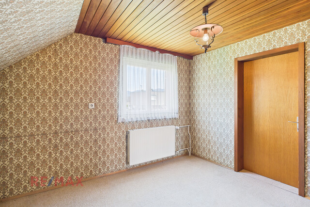 Wohnen in Lauterach: Einfamilienhaus mit großem Grundstück und Renovierungspotenzial