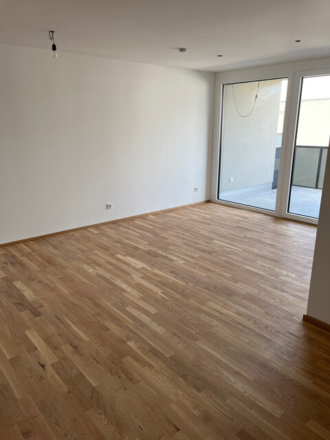 Moderne 2 Zimmer Dachgeschosswohnung mit Garage, Balkon und Keller in Neubau - provisionsfrei