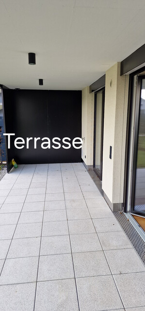 Neubau Gartenwohnung mit 20 m² Terrasse, 70 m² Garten,  6 m² Kellerabteil, 1 Tiefgaragenstellplatz à 20.000,00 e (Kauf)