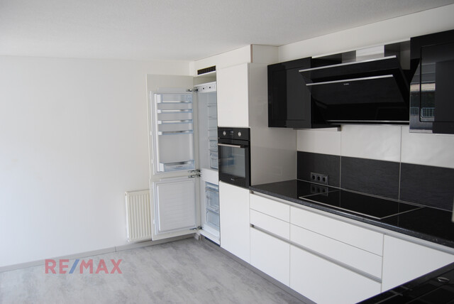 Zinshaus mit Pizzeria und bebaubarer Grundstücksreserve – Alles an einem Standort