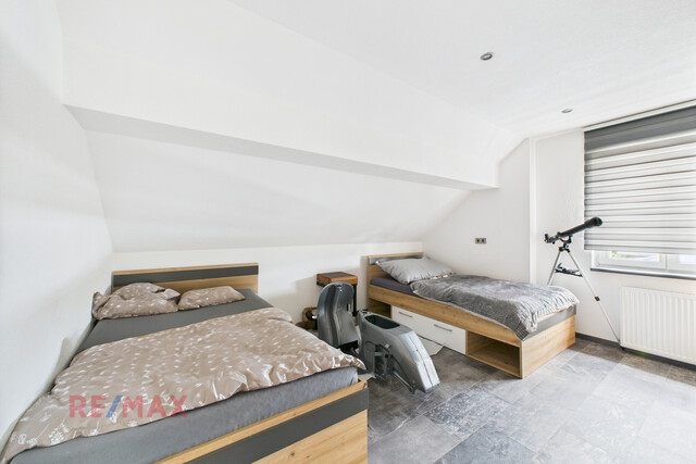 Zinshaus mit Pizzeria und bebaubarer Grundstücksreserve – Alles an einem Standort