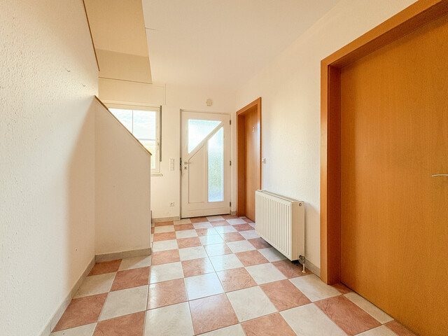 Renovierungsbedürftiges Einfamilienhaus mit Potenzial in sonniger Lage