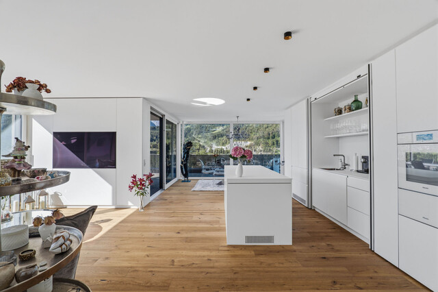 Stilvolle Penthousewohnung mit privatem Lift, großzügiger Dachterrasse und beeindruckender Bergkulisse!