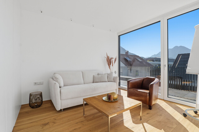 Stilvolle Penthousewohnung mit privatem Lift, großzügiger Dachterrasse und beeindruckender Bergkulisse!