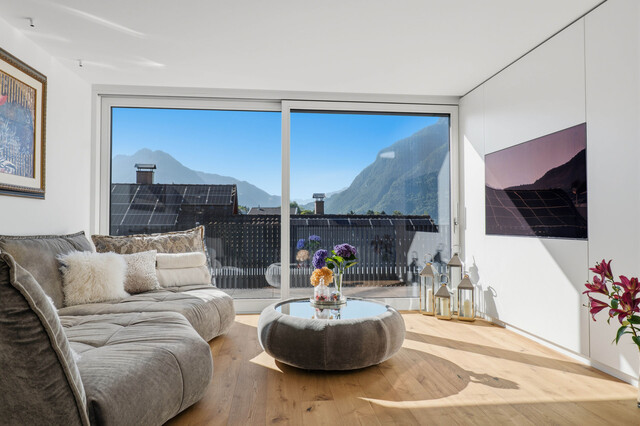 Stilvolle Penthousewohnung mit privatem Lift, großzügiger Dachterrasse und beeindruckender Bergkulisse!