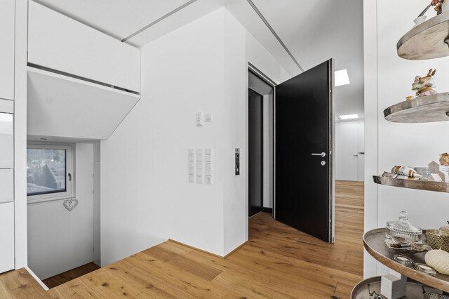 Stilvolle Penthousewohnung mit privatem Lift, großzügiger Dachterrasse und beeindruckender Bergkulisse!