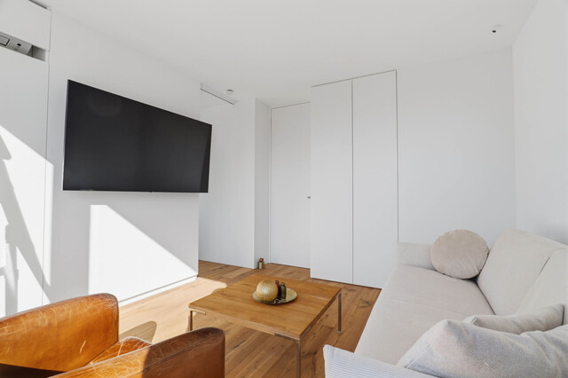 Stilvolle Penthousewohnung mit privatem Lift, großzügiger Dachterrasse und beeindruckender Bergkulisse!
