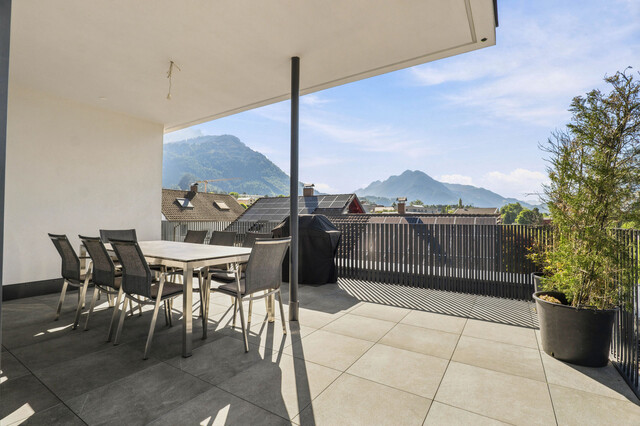 Stilvolle Penthousewohnung mit privatem Lift, großzügiger Dachterrasse und beeindruckender Bergkulisse!