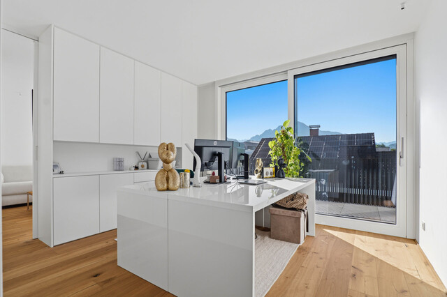Stilvolle Penthousewohnung mit privatem Lift, großzügiger Dachterrasse und beeindruckender Bergkulisse!