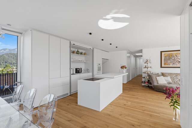 Stilvolle Penthousewohnung mit privatem Lift, großzügiger Dachterrasse und beeindruckender Bergkulisse!