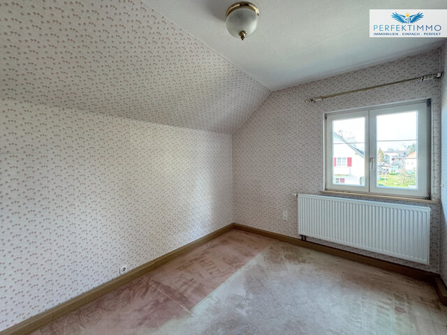 Haus mit großem Garten und Gestaltungspotenzial