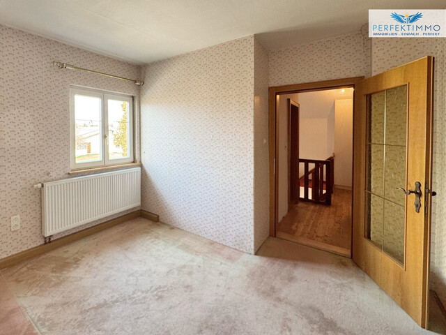 Haus mit großem Garten und Gestaltungspotenzial