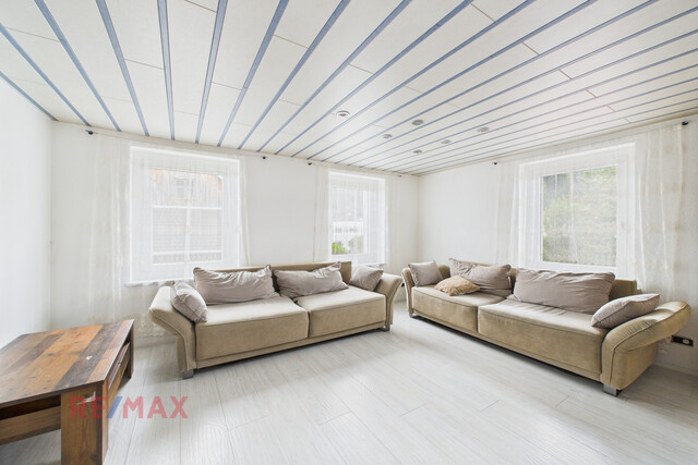 Zinshaus mit Pizzeria und bebaubarer Grundstücksreserve – Alles an einem Standort