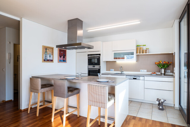 Exklusive Penthouse-Maisonette mit 100 m² Dachterrasse und Alpenpanorama!