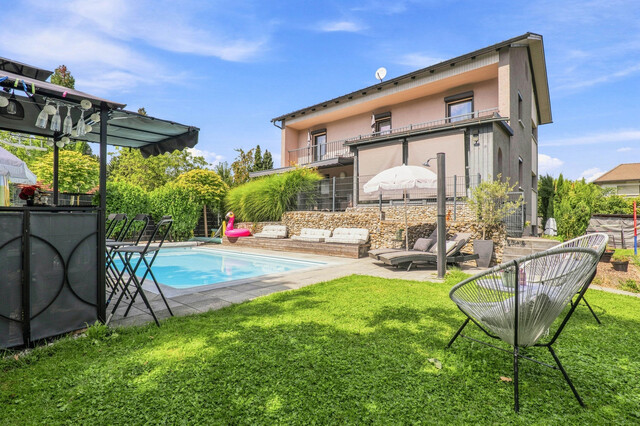Privates Wohnglück in Lustenau – Einfamilienhaus mit Salzwasserpool, Wintergarten & Poolhaus!