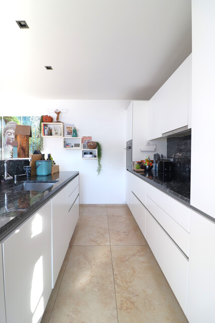 Außergewöhnliche 4 Zimmer-Dachgeschoßwohnung mit großer Terrasse (75m²) und 3 Tiefgaragen-Stellplätzen!