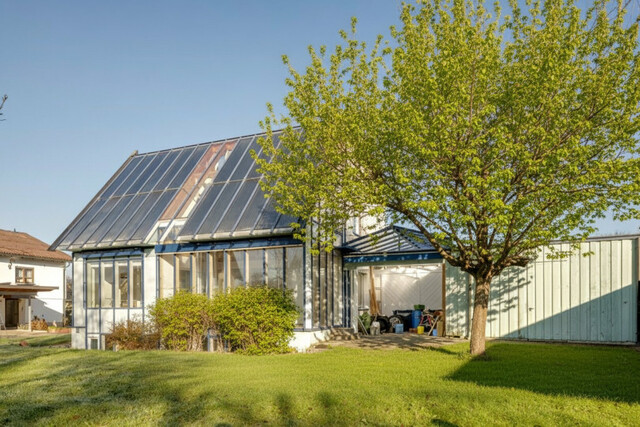 Einzigartiges Einfamilienhaus mit wunderschönem Wintergarten und Dachterasse in Altach!