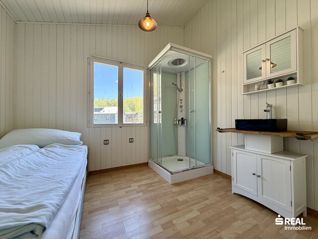 Ferienhaus mit Bootsgarage inklusive Motorboot