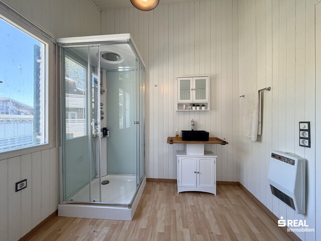 Ferienhaus mit Bootsgarage inklusive Motorboot