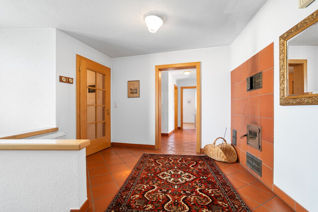 Kaminfeuer & Panoramablick: das Ried von der Terrasse aus genießen