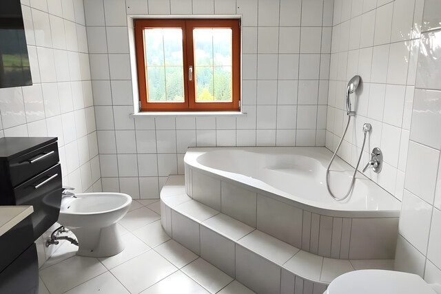 Charmante 3-Zimmer-Altbauwohnung mit Terrasse, Keller und Garage in Riezlern