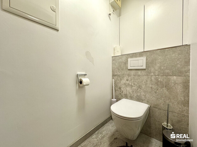 Modernisierte 4-Zimmerwohnung mit Balkon und Garagenbox