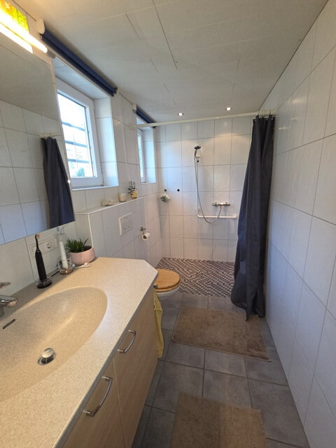 Bezauberndes Einfamilienhaus mit Einliegerwohnung und schönem Garten in zentraler Lage von Altach!