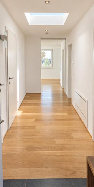 Provisionsfreie helle Dachgeschosswohnung mit Garage und Terrasse in Seenähe